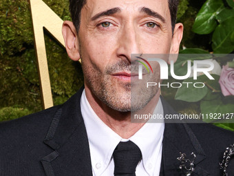 Adrien Brody wearing Thom Browne arrives at the 82nd Annual Golden Globe Awards held at The Beverly Hilton Hotel on January 5, 2025 in Bever...