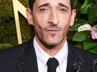 Adrien Brody wearing Thom Browne arrives at the 82nd Annual Golden Globe Awards held at The Beverly Hilton Hotel on January 5, 2025 in Bever...