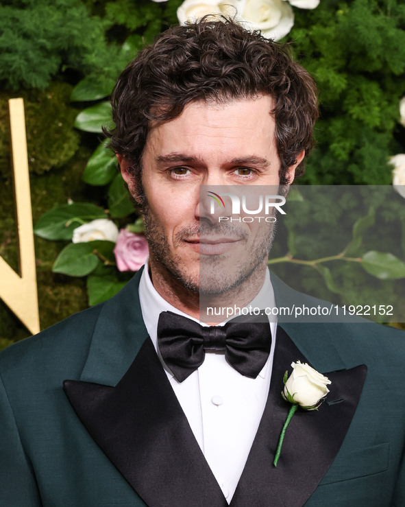 Adam Brody wearing Prada arrives at the 82nd Annual Golden Globe Awards held at The Beverly Hilton Hotel on January 5, 2025 in Beverly Hills...