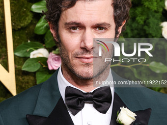 Adam Brody wearing Prada arrives at the 82nd Annual Golden Globe Awards held at The Beverly Hilton Hotel on January 5, 2025 in Beverly Hills...