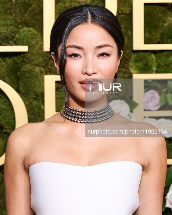 Anna Sawai wearing a Dior dress and Cartier jewelry arrives at the 82nd Annual Golden Globe Awards held at The Beverly Hilton Hotel on Janua...