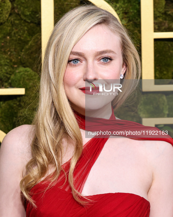 Dakota Fanning wearing custom Dolce and Gabanna arrives at the 82nd Annual Golden Globe Awards held at The Beverly Hilton Hotel on January 5...