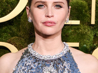 Felicity Jones wearing Prada with Chopard jewelry arrives at the 82nd Annual Golden Globe Awards held at The Beverly Hilton Hotel on January...