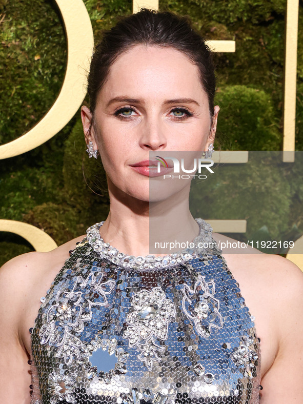 Felicity Jones wearing Prada with Chopard jewelry arrives at the 82nd Annual Golden Globe Awards held at The Beverly Hilton Hotel on January...