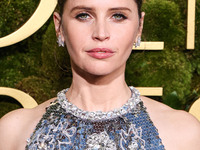 Felicity Jones wearing Prada with Chopard jewelry arrives at the 82nd Annual Golden Globe Awards held at The Beverly Hilton Hotel on January...