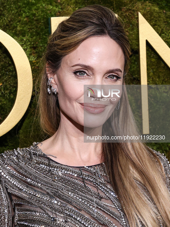 Angelina Jolie wearing McQueen arrives at the 82nd Annual Golden Globe Awards held at The Beverly Hilton Hotel on January 5, 2025 in Beverly...