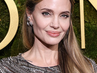 Angelina Jolie wearing McQueen arrives at the 82nd Annual Golden Globe Awards held at The Beverly Hilton Hotel on January 5, 2025 in Beverly...