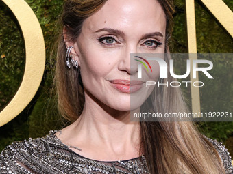 Angelina Jolie wearing McQueen arrives at the 82nd Annual Golden Globe Awards held at The Beverly Hilton Hotel on January 5, 2025 in Beverly...