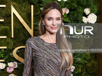 Angelina Jolie wearing McQueen arrives at the 82nd Annual Golden Globe Awards held at The Beverly Hilton Hotel on January 5, 2025 in Beverly...