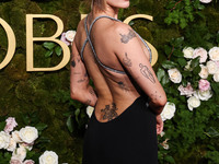 Miley Cyrus wearing Celine with Da Beers jewelry arrives at the 82nd Annual Golden Globe Awards held at The Beverly Hilton Hotel on January...