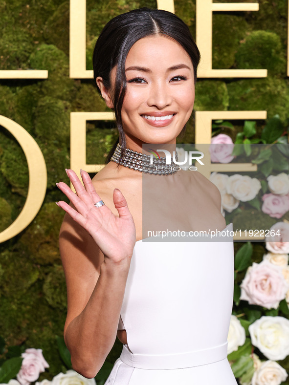 Anna Sawai wearing a Dior dress and Cartier jewelry arrives at the 82nd Annual Golden Globe Awards held at The Beverly Hilton Hotel on Janua...