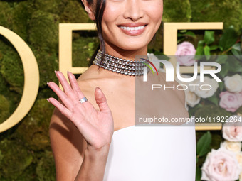 Anna Sawai wearing a Dior dress and Cartier jewelry arrives at the 82nd Annual Golden Globe Awards held at The Beverly Hilton Hotel on Janua...