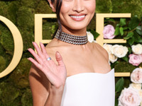 Anna Sawai wearing a Dior dress and Cartier jewelry arrives at the 82nd Annual Golden Globe Awards held at The Beverly Hilton Hotel on Janua...