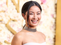 Anna Sawai wearing a Dior dress and Cartier jewelry arrives at the 82nd Annual Golden Globe Awards held at The Beverly Hilton Hotel on Janua...