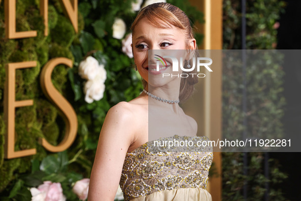 Ariana Grande Butera wearing archive Givenchy and Stuart Weitzman shoes arrives at the 82nd Annual Golden Globe Awards held at The Beverly H...