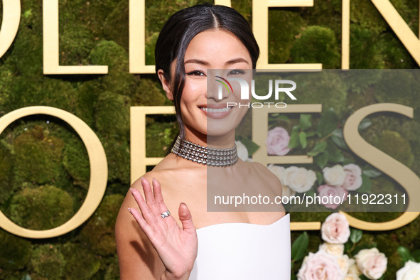 Anna Sawai wearing a Dior dress and Cartier jewelry arrives at the 82nd Annual Golden Globe Awards held at The Beverly Hilton Hotel on Janua...