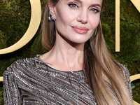 Angelina Jolie wearing McQueen arrives at the 82nd Annual Golden Globe Awards held at The Beverly Hilton Hotel on January 5, 2025 in Beverly...