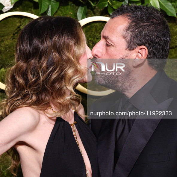 Jackie Sandler and husband Adam Sandler arrive at the 82nd Annual Golden Globe Awards held at The Beverly Hilton Hotel on January 5, 2025 in...