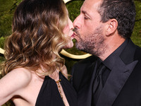 Jackie Sandler and husband Adam Sandler arrive at the 82nd Annual Golden Globe Awards held at The Beverly Hilton Hotel on January 5, 2025 in...