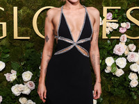 Miley Cyrus wearing Celine with Da Beers jewelry arrives at the 82nd Annual Golden Globe Awards held at The Beverly Hilton Hotel on January...