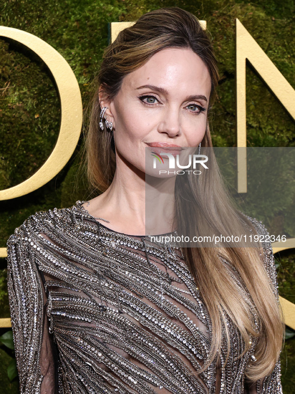 Angelina Jolie wearing McQueen arrives at the 82nd Annual Golden Globe Awards held at The Beverly Hilton Hotel on January 5, 2025 in Beverly...