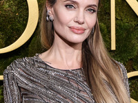 Angelina Jolie wearing McQueen arrives at the 82nd Annual Golden Globe Awards held at The Beverly Hilton Hotel on January 5, 2025 in Beverly...