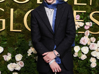 Timothee Chalamet wearing Tom Ford arrives at the 82nd Annual Golden Globe Awards held at The Beverly Hilton Hotel on January 5, 2025 in Bev...