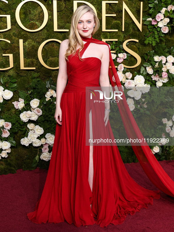 Dakota Fanning wearing custom Dolce and Gabanna arrives at the 82nd Annual Golden Globe Awards held at The Beverly Hilton Hotel on January 5...