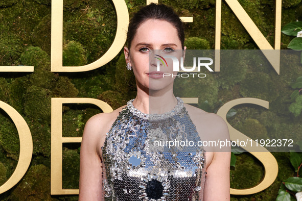 Felicity Jones wearing Prada with Chopard jewelry arrives at the 82nd Annual Golden Globe Awards held at The Beverly Hilton Hotel on January...