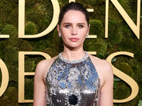 Felicity Jones wearing Prada with Chopard jewelry arrives at the 82nd Annual Golden Globe Awards held at The Beverly Hilton Hotel on January...