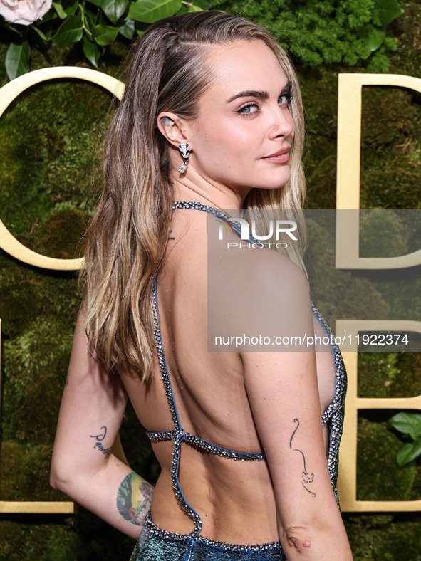 Cara Delevingne wearing Gucci arrives at the 82nd Annual Golden Globe Awards held at The Beverly Hilton Hotel on January 5, 2025 in Beverly...