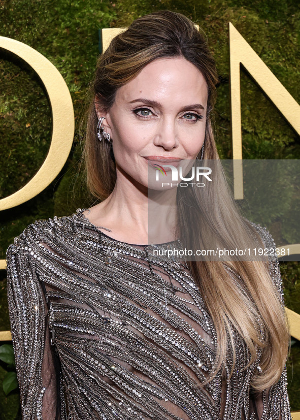 Angelina Jolie wearing McQueen arrives at the 82nd Annual Golden Globe Awards held at The Beverly Hilton Hotel on January 5, 2025 in Beverly...