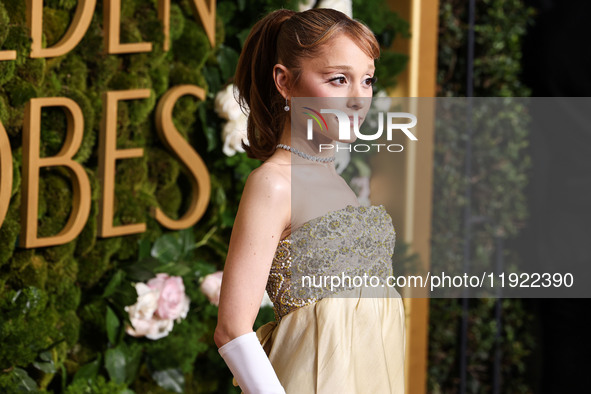 Ariana Grande Butera wearing archive Givenchy and Stuart Weitzman shoes arrives at the 82nd Annual Golden Globe Awards held at The Beverly H...