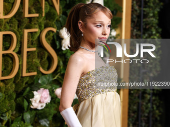 Ariana Grande Butera wearing archive Givenchy and Stuart Weitzman shoes arrives at the 82nd Annual Golden Globe Awards held at The Beverly H...