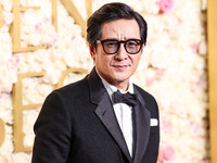 Ke Huy Quan wearing Thom Browne arrives at the 82nd Annual Golden Globe Awards held at The Beverly Hilton Hotel on January 5, 2025 in Beverl...