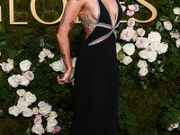 Miley Cyrus wearing Celine with Da Beers jewelry arrives at the 82nd Annual Golden Globe Awards held at The Beverly Hilton Hotel on January...