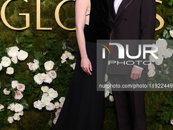 Kirsten Dunst and husband Jesse Plemons arrive at the 82nd Annual Golden Globe Awards held at The Beverly Hilton Hotel on January 5, 2025 in...