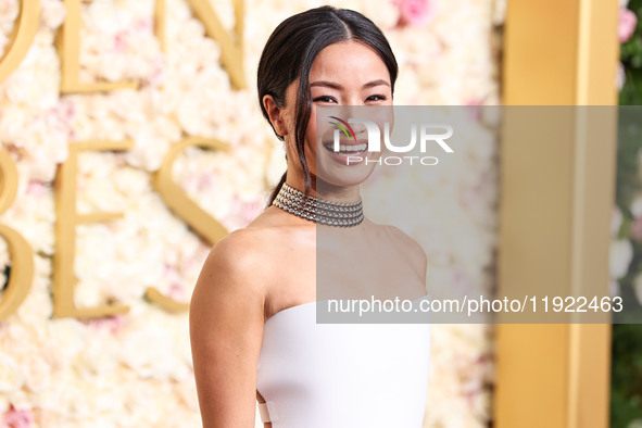 Anna Sawai wearing a Dior dress and Cartier jewelry arrives at the 82nd Annual Golden Globe Awards held at The Beverly Hilton Hotel on Janua...