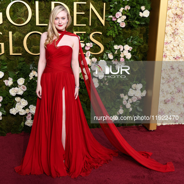 Dakota Fanning wearing custom Dolce and Gabanna arrives at the 82nd Annual Golden Globe Awards held at The Beverly Hilton Hotel on January 5...