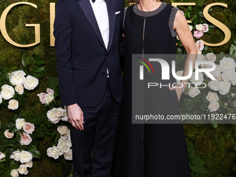 Kit Bernard and mother Jodie Foster arrive at the 82nd Annual Golden Globe Awards held at The Beverly Hilton Hotel on January 5, 2025 in Bev...