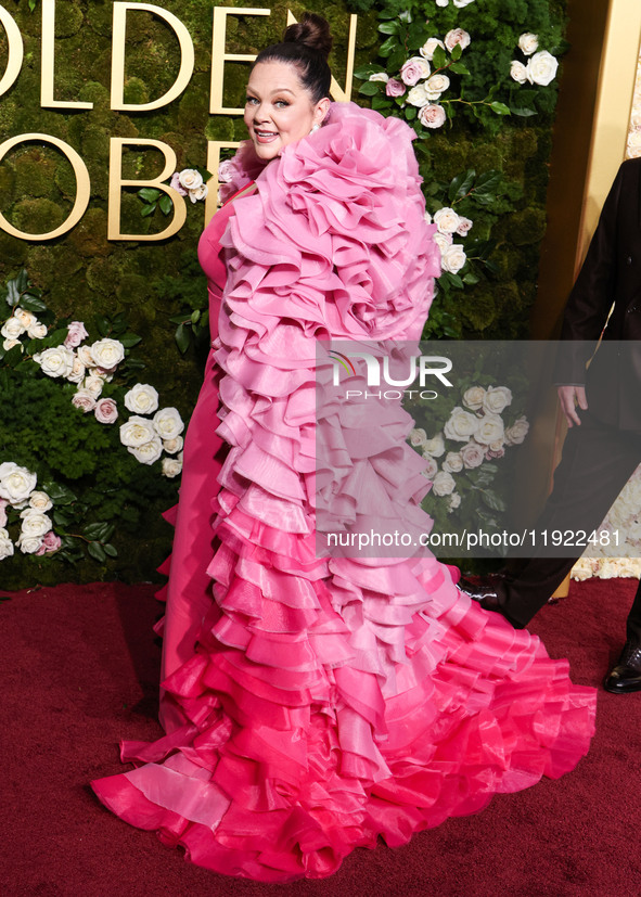 Melissa McCarthy wearing Christian Siriano arrives at the 82nd Annual Golden Globe Awards held at The Beverly Hilton Hotel on January 5, 202...