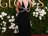 Miley Cyrus wearing Celine with Da Beers jewelry arrives at the 82nd Annual Golden Globe Awards held at The Beverly Hilton Hotel on January...