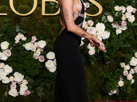 Miley Cyrus wearing Celine with Da Beers jewelry arrives at the 82nd Annual Golden Globe Awards held at The Beverly Hilton Hotel on January...