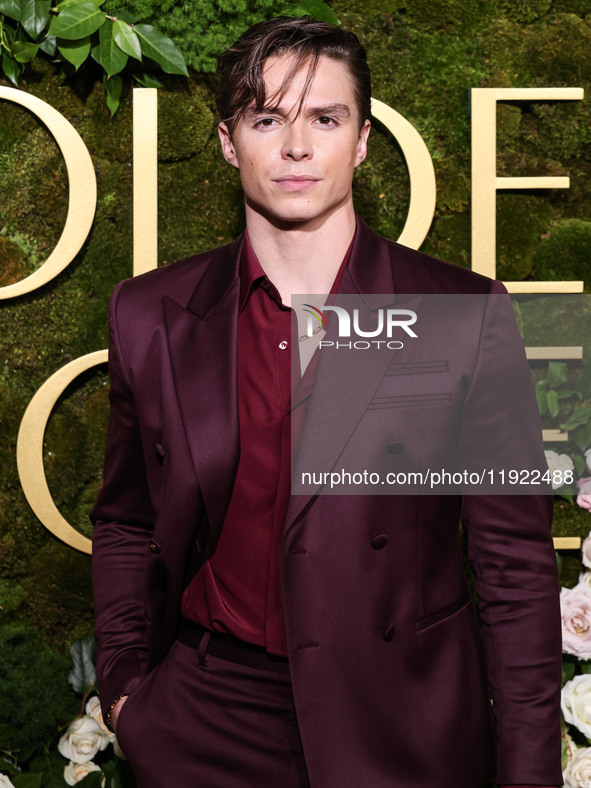 Nicholas Alexander Chavez wearing Versace with Christian Louboutin boots arrives at the 82nd Annual Golden Globe Awards held at The Beverly...