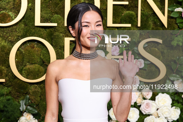 Anna Sawai wearing a Dior dress and Cartier jewelry arrives at the 82nd Annual Golden Globe Awards held at The Beverly Hilton Hotel on Janua...