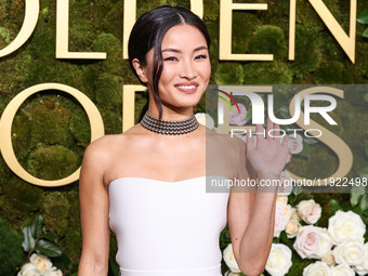 Anna Sawai wearing a Dior dress and Cartier jewelry arrives at the 82nd Annual Golden Globe Awards held at The Beverly Hilton Hotel on Janua...