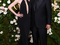 Jackie Sandler and husband Adam Sandler arrive at the 82nd Annual Golden Globe Awards held at The Beverly Hilton Hotel on January 5, 2025 in...