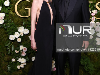 Jackie Sandler and husband Adam Sandler arrive at the 82nd Annual Golden Globe Awards held at The Beverly Hilton Hotel on January 5, 2025 in...