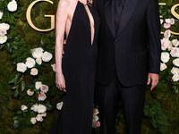 Jackie Sandler and husband Adam Sandler arrive at the 82nd Annual Golden Globe Awards held at The Beverly Hilton Hotel on January 5, 2025 in...