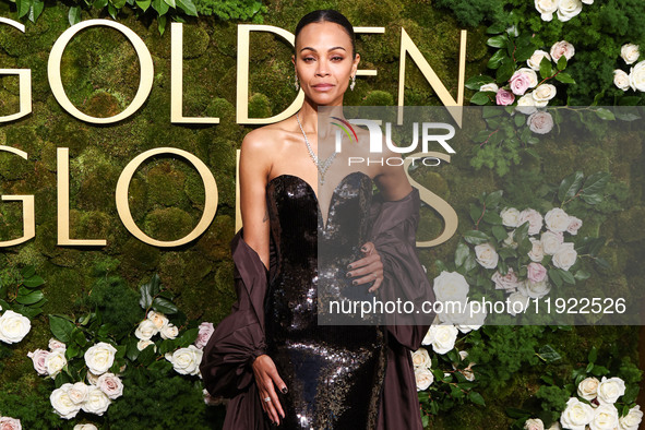 Zoe Saldana wearing Saint Laurent arrives at the 82nd Annual Golden Globe Awards held at The Beverly Hilton Hotel on January 5, 2025 in Beve...